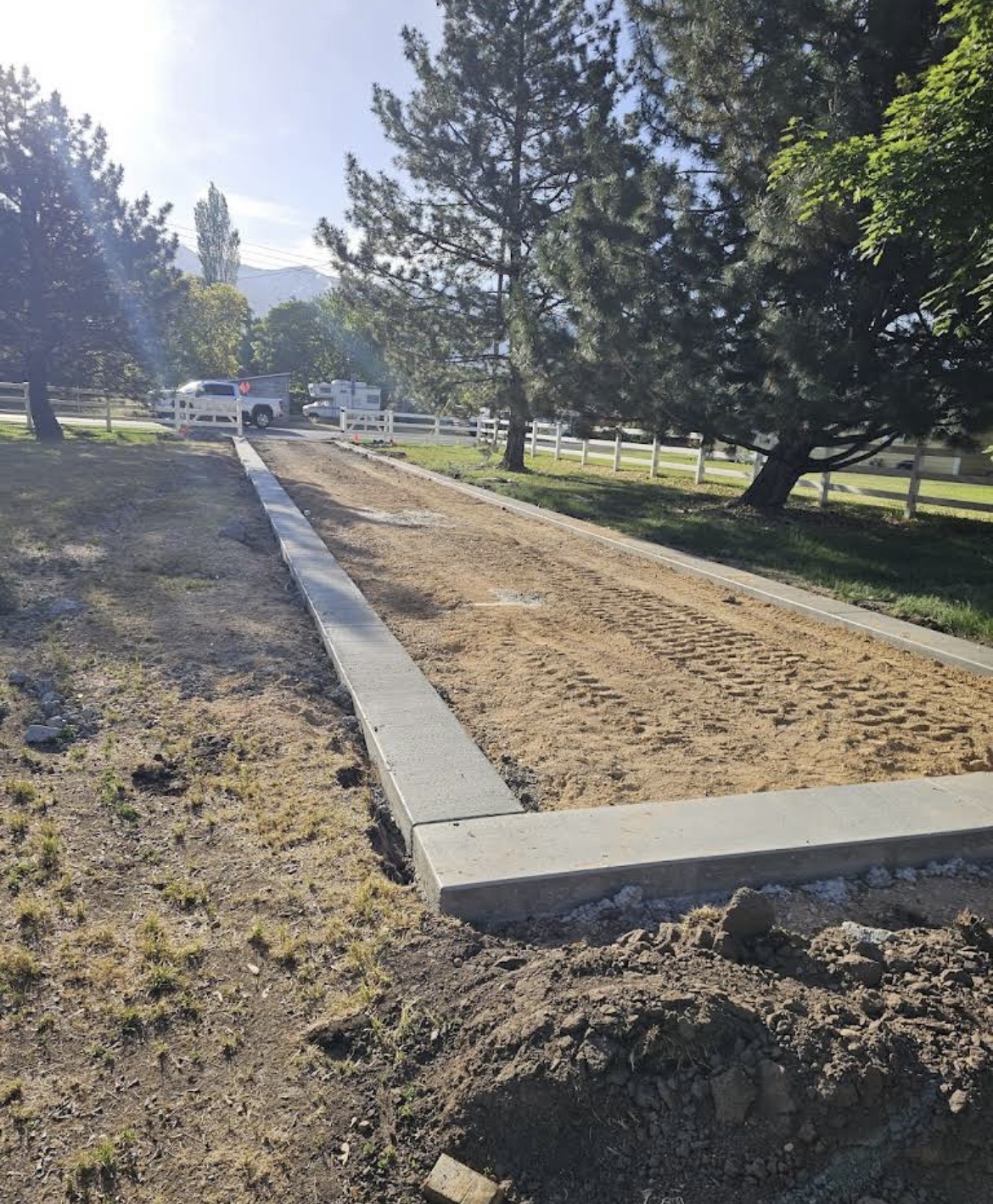 New concrete curb and walkway in progress